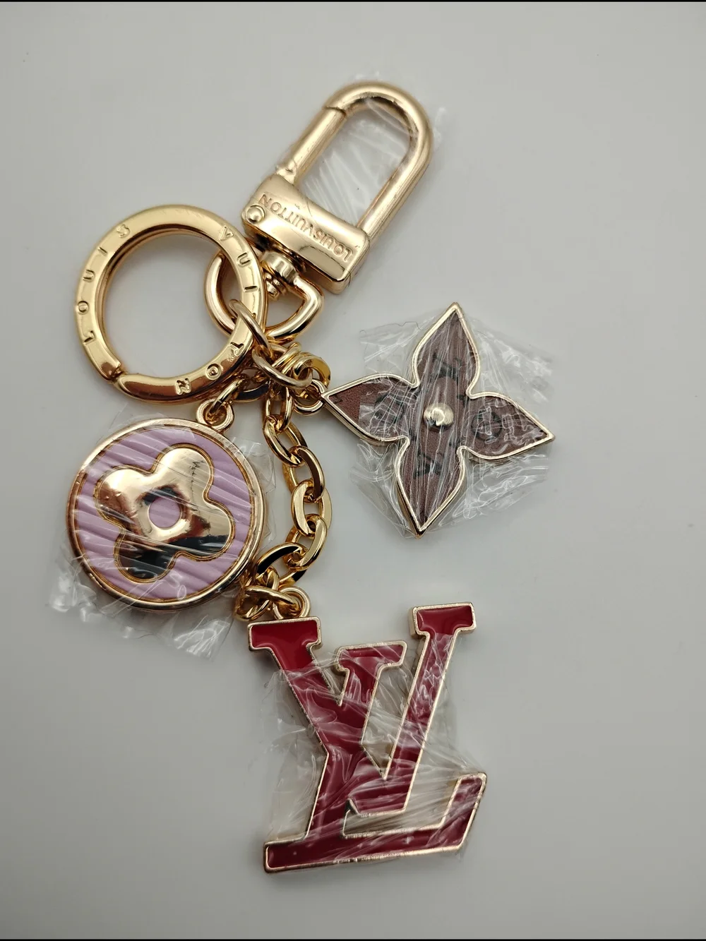 Louis Vuitton Red & Gold-Tone Keychain Charm With Pink and Brown Accents BNWOT